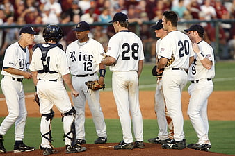 Baseball Team Huddle on Pitch During Game