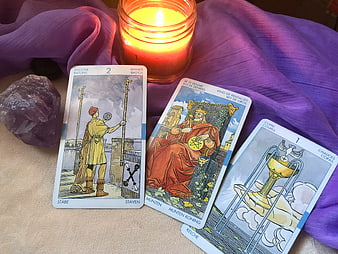 Tarot Card Reading Setup With Candle And Amethyst Crystal