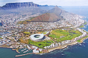 Aerial View of Cape Town Stadium, Table Mountain, and Atlantic Ocean