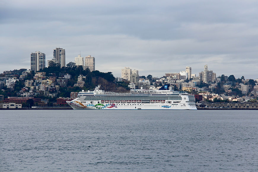 Cruise ship sailing past San Francisco city skyline
