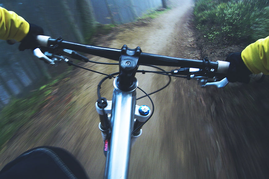 First Person View Mountain Biking on Forest Trail