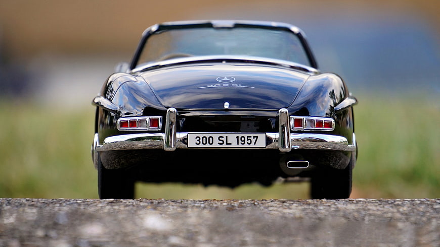 Rear view of black Mercedes 300 SL miniature model car