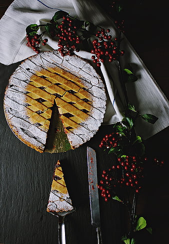 Top View of Lattice Pie with Red Berries and Knife