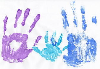 Colorful Painted Handprints On White Paper Background