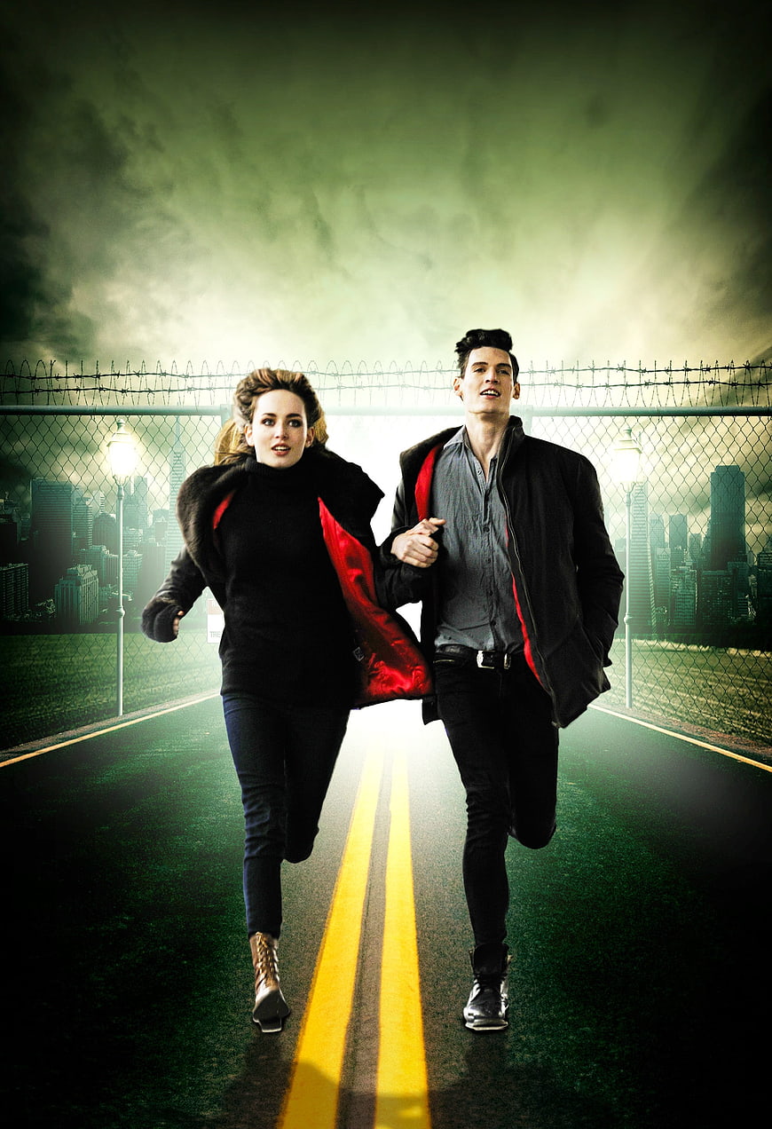 Couple Running on Road with City Skyline Background