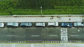 Aerial View of Parked Cars and Pedestrians on City Street