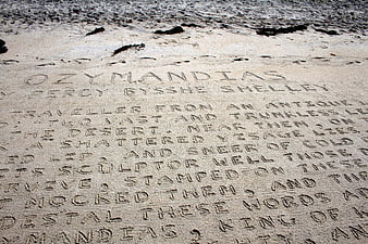 Ozymandias poem text written in sand on beach