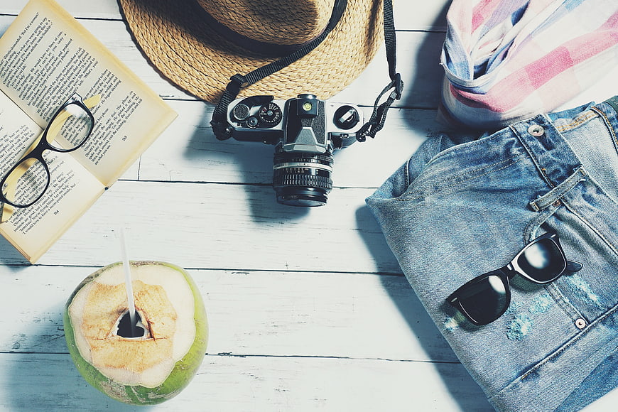 Summer Travel Flat Lay with Vintage Camera, Straw Hat, and Coconut