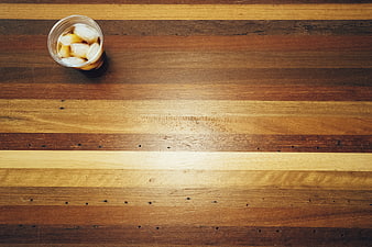 Top View of Iced Coffee on Striped Wooden Table
