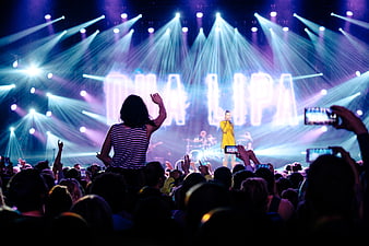 Dua Lipa concert performance with crowd recording on phones