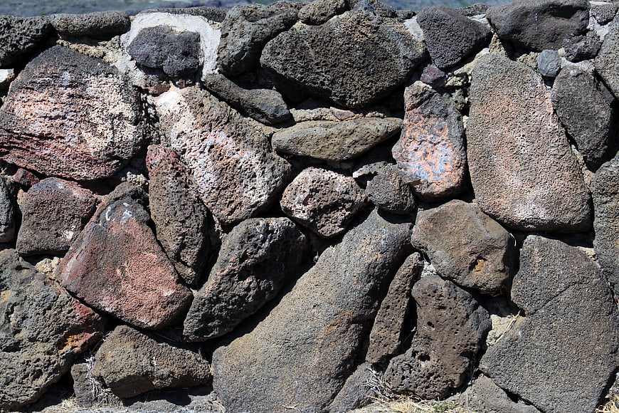 Rough volcanic stone wall texture background