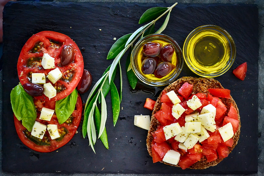 Top View of Dakos with Tomatoes, Feta, and Olive Oil