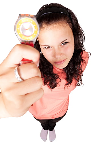 Young Woman Pointing Watch Upward From High Angle White Background