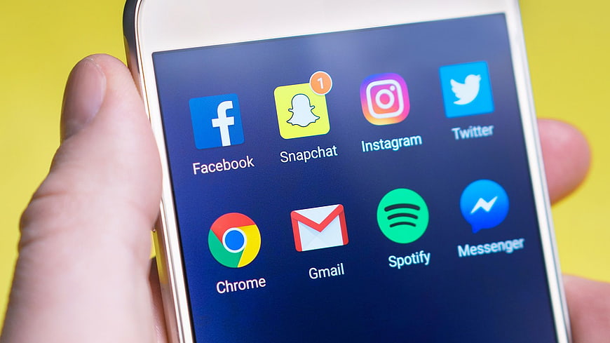 Close-up of Smartphone Screen with Social Media App Icons
