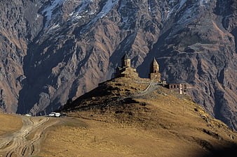 Gergeti Trinity Church on Mountain Ridge in Georgia