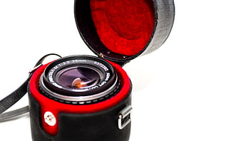 Vintage Pentax Lens in Red Leather Case on White Background