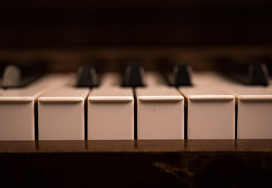 Close-up of vintage piano keys with shallow depth of field