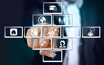 Businessman touching digital interface icons on virtual screen
