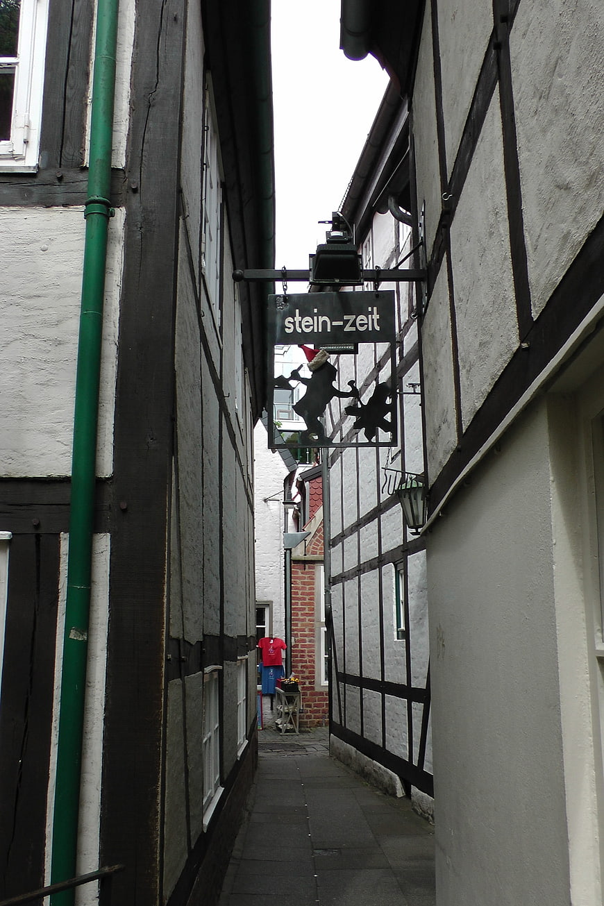 Narrow historic alley in Bremen Schnoor Quarter with half-timbered houses