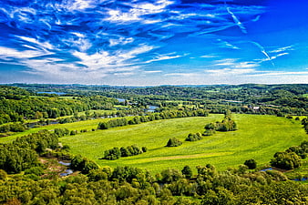 Aerial View of Green Meadows and River Valley in Germany