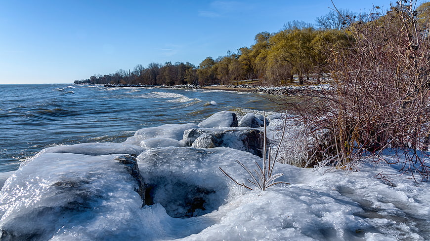 Frozen Ice Rocks on Winter Lake Shoreline