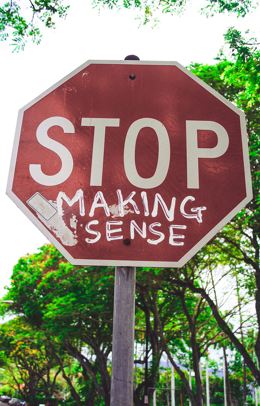 Stop Making Sense Graffiti on Red Traffic Sign