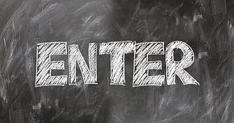 Handwritten Enter Text On Dark Chalkboard Background