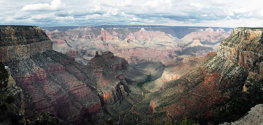 Panoramic View of Grand Canyon with Cloudy Sky