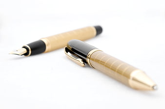 Luxury Gold and Black Fountain Pen Set on White Background