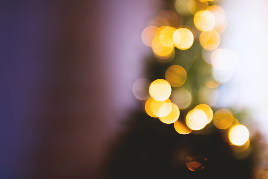 Abstract Yellow Bokeh Lights on Dark Background