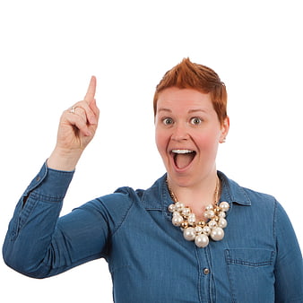 Excited woman pointing up with idea gesture