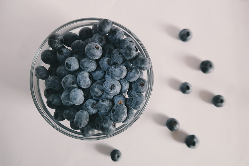 Top View of Fresh Blueberries in Glass Bowl