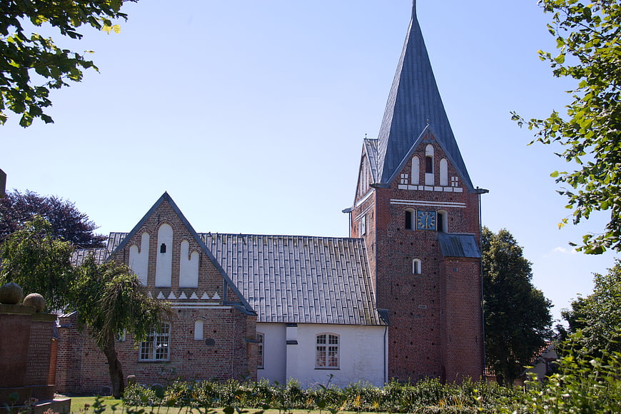 Historic Brick Church with Tall Spire in Denmark