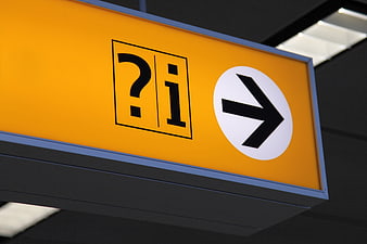 Yellow Information Sign with Arrow and Question Mark Symbol