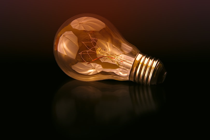 Vintage Edison Light Bulb on Dark Background