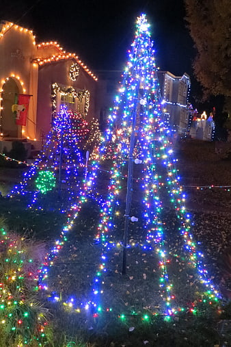 Colorful Christmas Lights on Front Lawn at Night