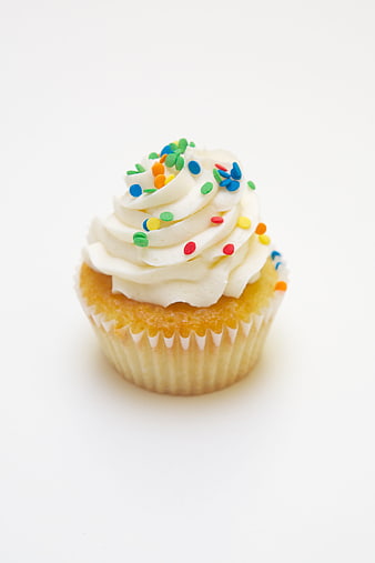 Vanilla Cupcake with White Frosting and Colorful Sprinkles