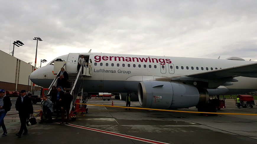 Passengers boarding Germanwings airplane on airport tarmac