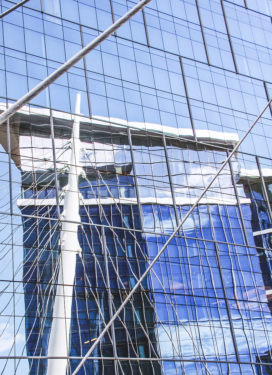 Abstract Reflection of Modern Glass Building Facade