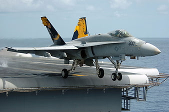 FA-18C Hornet Fighter Jet Taking Off from Aircraft Carrier