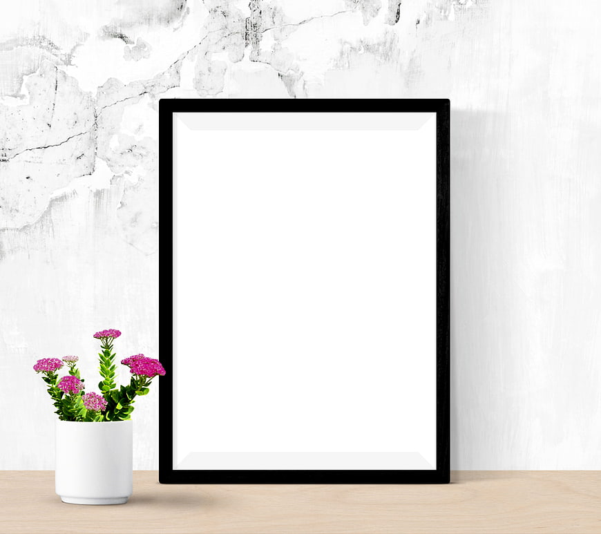 Black Picture Frame Mockup On Wooden Desk With Pink Flowers