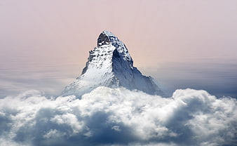 Matterhorn Mountain Peak Rising Above Clouds in Switzerland