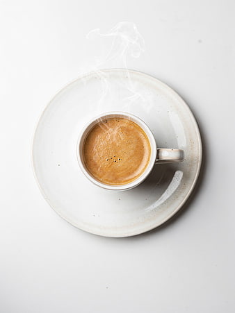 Top View of Steaming Espresso in Minimalist Ceramic Cup