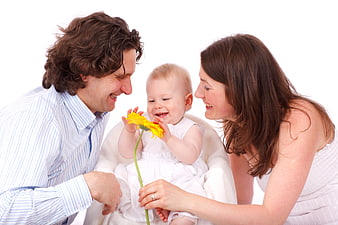 Happy family with baby holding yellow flower on white background