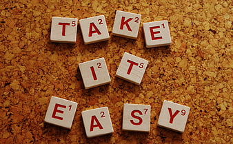 Scrabble Tiles Spelling Take It Easy on Cork Board