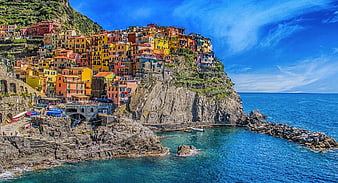 Colorful houses on cliffside in Cinque Terre, Italy
