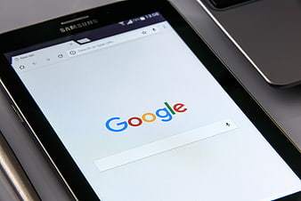 Samsung tablet displaying Google search homepage on screen