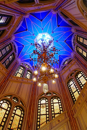 Interior View of Disneyland Castle Dome with Chandelier and Stained Glass