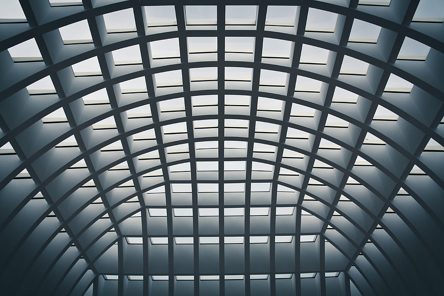 Abstract geometric grid ceiling with skylights