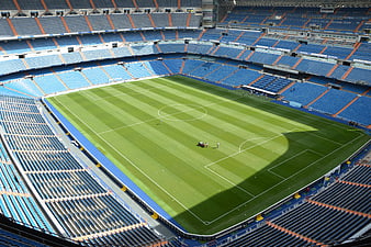 Wide aerial view of empty Santiago Bernabeu stadium pitch
